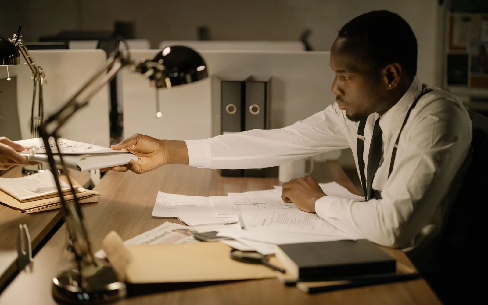 Licensed private investigator reviewing professional case documentation